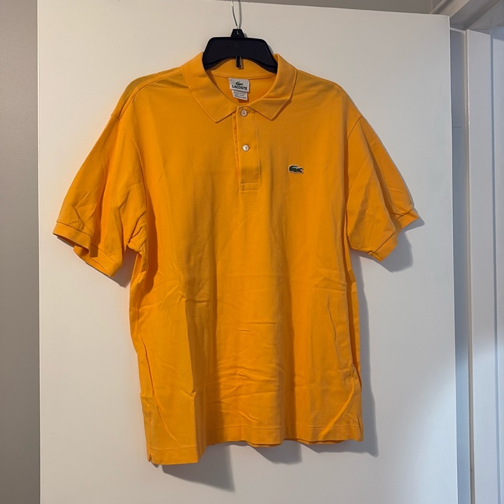 Men’s Lacoste polo.
